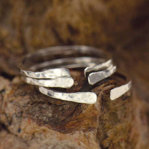 Handmade Sterling Silver Adjustable Hammered Ring. Hammered details add a faceted and shimmering finish. This ring is easily adjustable by opening or closing the gap. Quality handmade jewelry. Stacking rings. BOHO ring. Adjustable Rings. Bohemian style. Handmade jewelry. The Gypsy Collection - Lucky Birds Boutique