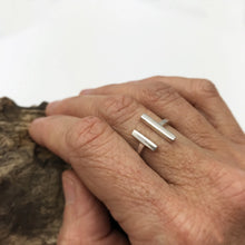 Load image into Gallery viewer, Parallel Bars Sterling Silver Ring on model. Modern jewelry and streamline design will make a beautiful addition to your ring collection. Wear this adjustable ring on whatever finger you see fit. Trending rings. Chic Jewelry styles. Sterling Silver Jewelry for women. The Lolita Collection- Lucky Birds Boutique