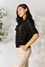 Load image into Gallery viewer, Women&#39;s ribbed knit half sleeve top with round neckline with sheer style. Features a see-through design with solid rectangular fabric detailing. Allows visibility of bralette. On model side view - Valerie Collection Mandy top
