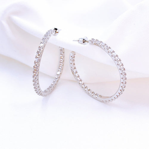 Silver Hoop Earrings with CZ Pave Settings. Total Bling. Statement Earrings. Lucky Birds - The Bae Collection.
