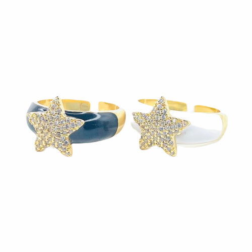 Black candy star ring and white candy star ring. plated with gold ring. Lucky Birds- The Valerie Collection. 