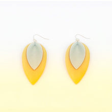 Load image into Gallery viewer, Nature inspired design. Flower petal drop earrings in two layers of yellow and grey. Made from luxurious soft vegan leather. Handpicked unique earring design. Women&#39;s earrings. 
