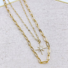 Load image into Gallery viewer, Double layer gold necklace. 18K gold plated chains with North Star pendant. Lucky Birds Jewelry and accessories. 
