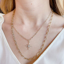 Load image into Gallery viewer, Double layer gold necklace. 18K gold plated chains with North Star pendant on model. Lucky Birds Jewelry and accessories. 
