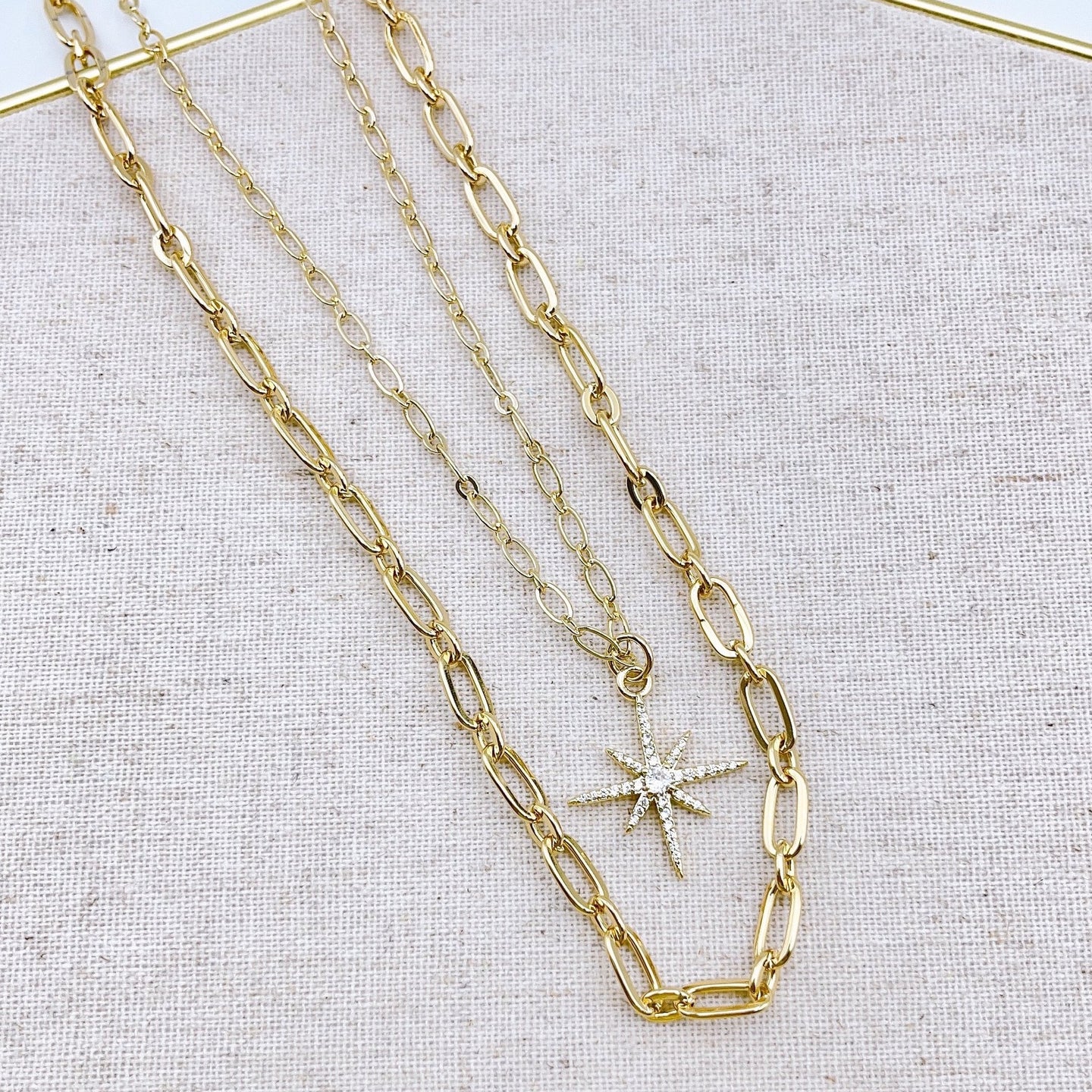 Double layer gold necklace. 18K gold plated chains with North Star pendant. Lucky Birds Jewelry and accessories. 