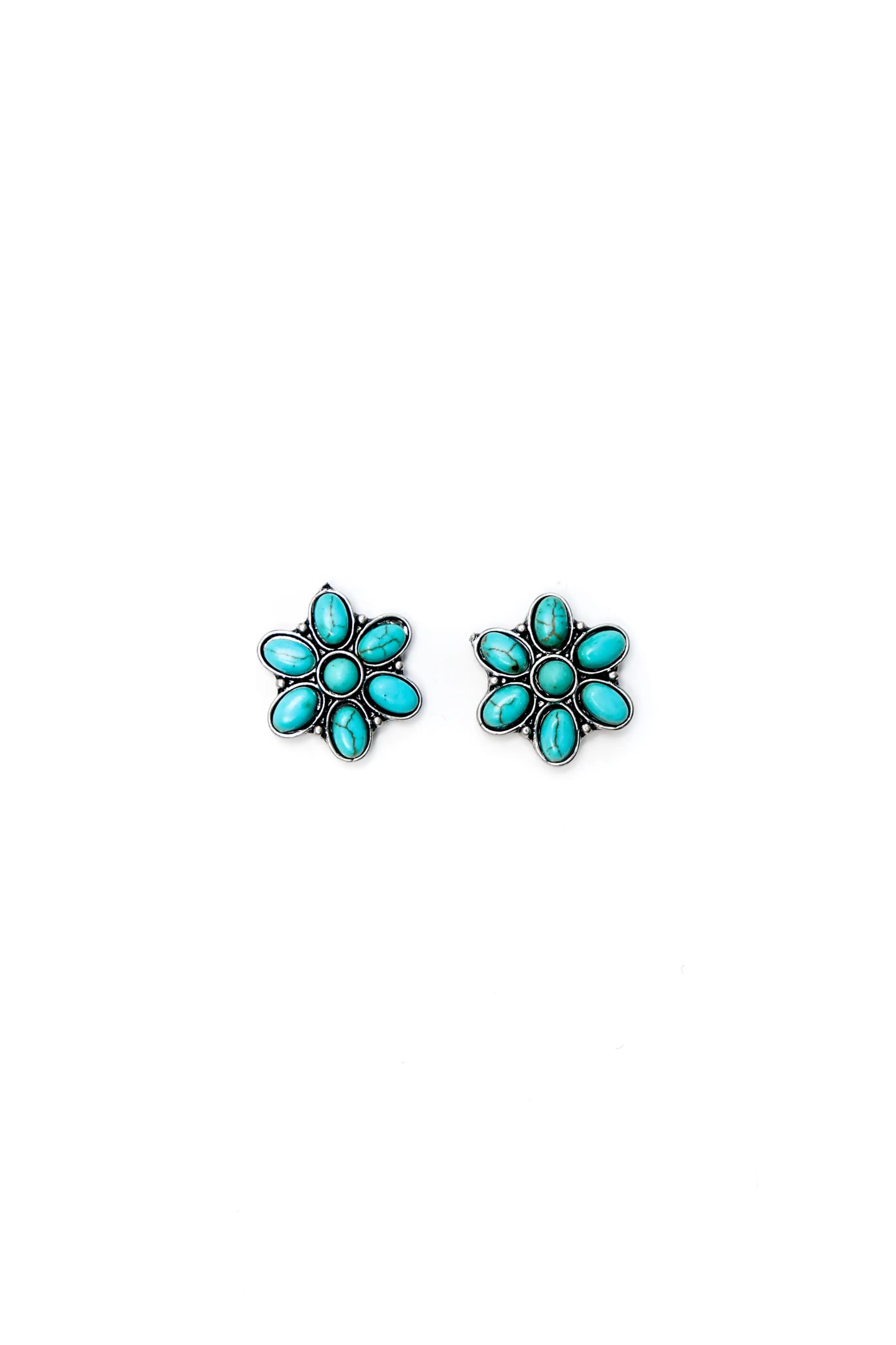 Turquoise flower stud earrings. Add that pop of color to your already amazing outfit. Silver and Turquoise stud earrings for women. Western style jewelry. Western jewelry for women. Turquoise Earrings. Turquoise Earrings. The Jolene Collection- Lucky Birds Boutique