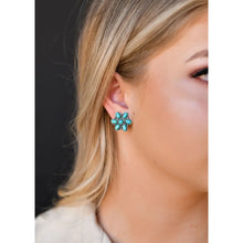 Load image into Gallery viewer, Turquoise flower stud earrings on model. Add that pop of color to your already amazing outfit. Silver and Turquoise stud earrings for women. Western style jewelry. Western jewelry for women. Turquoise Earrings. Turquoise Earrings. The Jolene Collection- Lucky Birds Boutique
