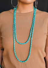 Load image into Gallery viewer, Extra long green turquoise beaded necklace on model - close up. Women&#39;s Western Style Jewelry. Turquoise necklace. Turquoise jewelry. Western Jewelry sets. The Jolene Collection - Lucky Birds Boutique

