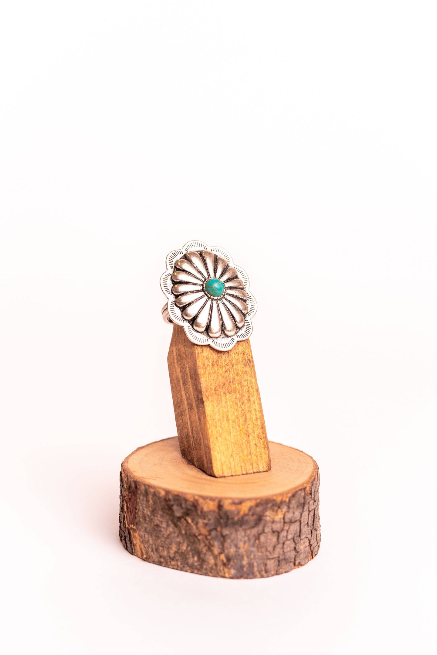 This large burnished silver adjustable concho ring with a turquoise stone accent is sure to attract compliments. Pairs well with our choker necklace with concho accent. Silver jewelry sets. Western Jewelry for Women. The Jolene Collection - Lucky Birds Boutique