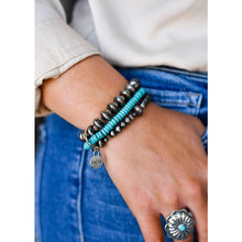 Load image into Gallery viewer, This large burnished silver adjustable concho ring with a turquoise stone accent is sure to attract compliments. Pairs well with our stretchy turquoise and faux Navajo pearl bracelet. Silver jewelry sets. Western Jewelry for Women. The Jolene Collection - Lucky Birds Boutique
